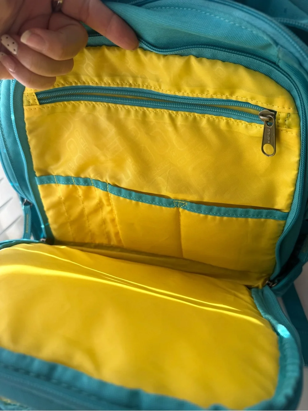 OGIO Aqua Blue Backpack with Yellow Logo